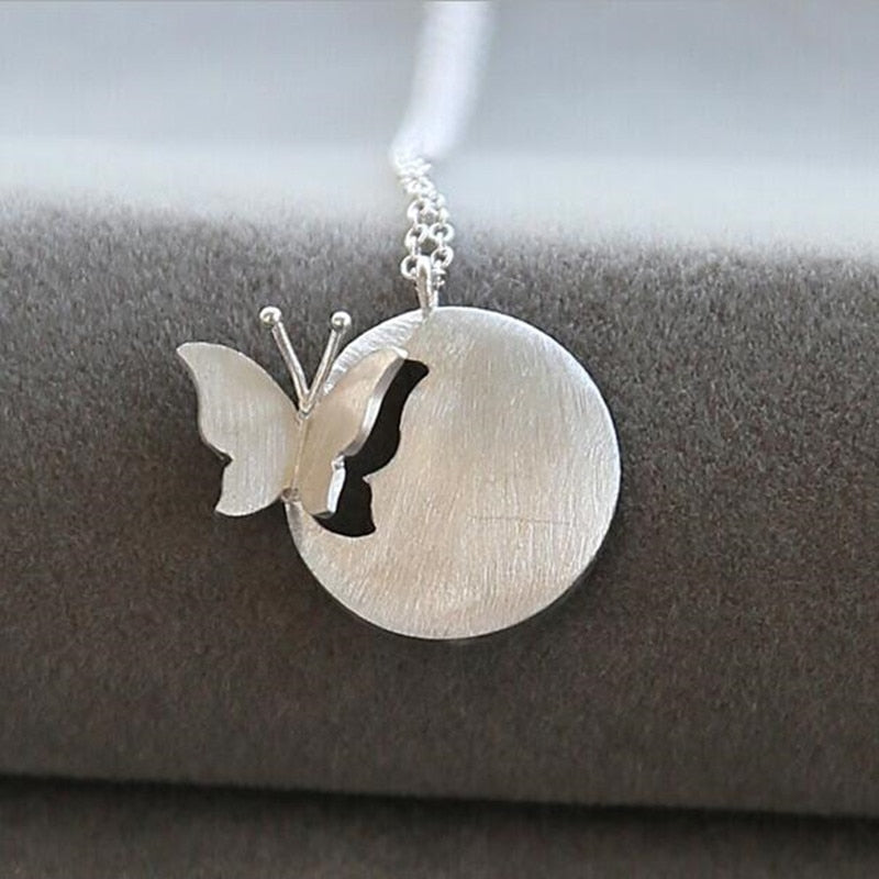 Butterfly on a Moon Necklace