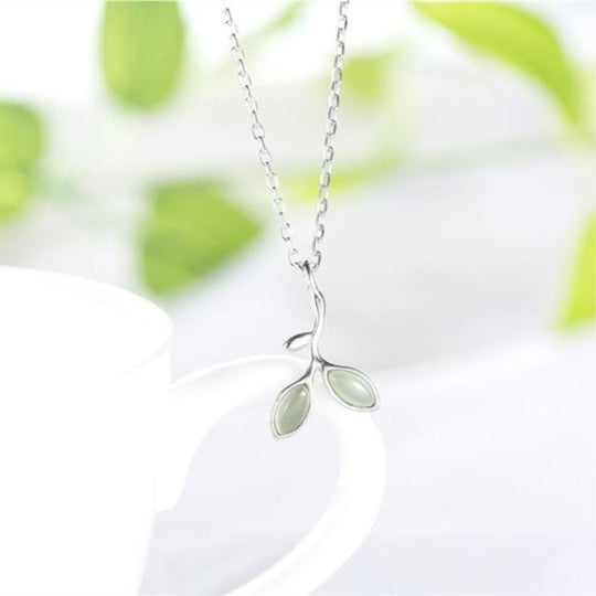 Crystal green olives with silver leaf necklace