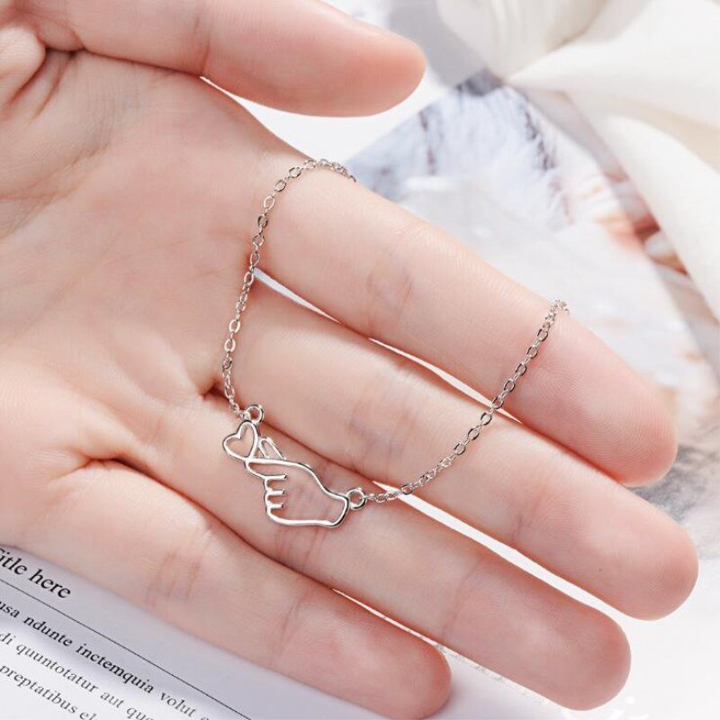 Hand with a Heart Bracelet